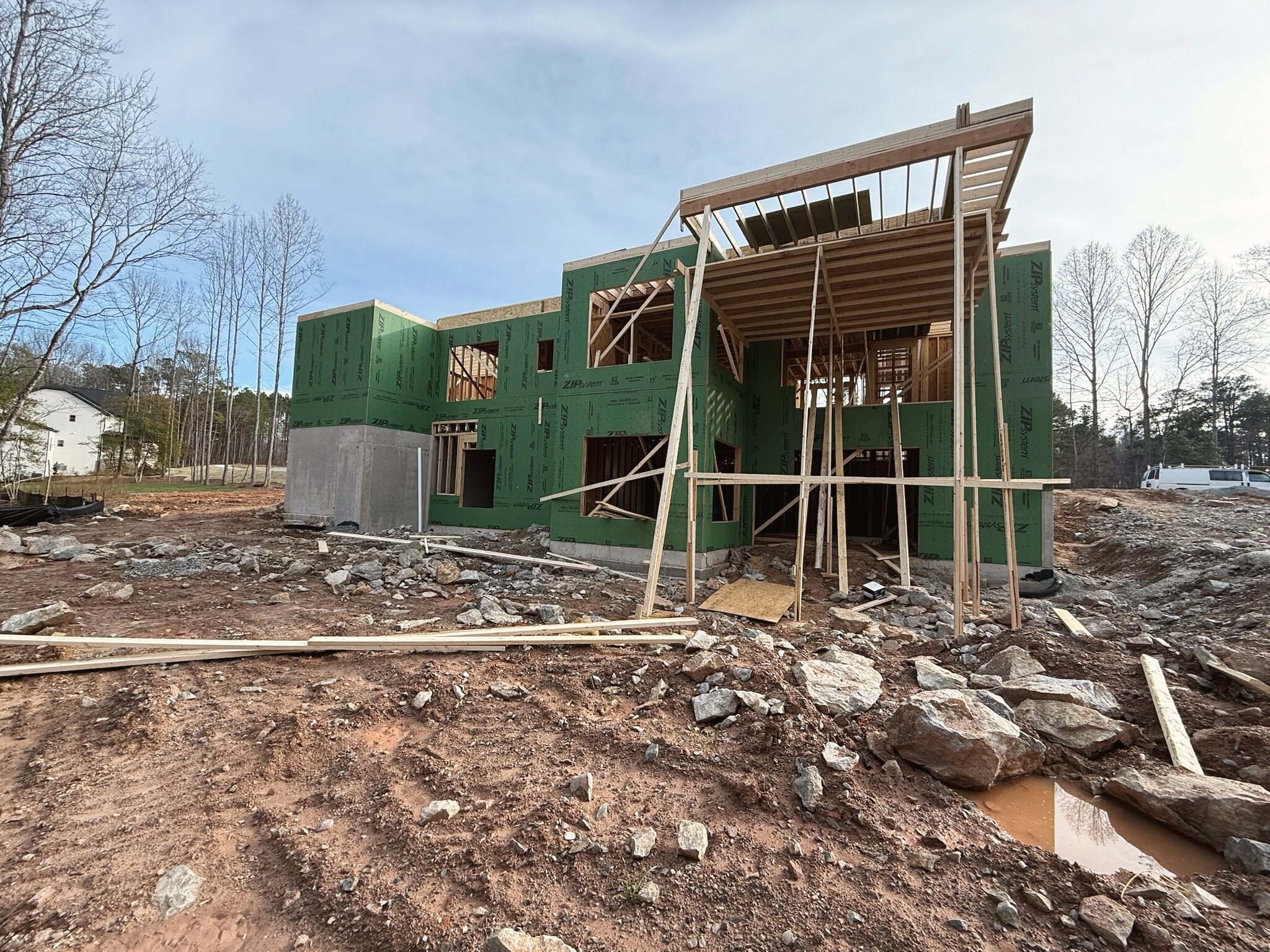 A Gemstone custom home under construction, sheathed and framed
