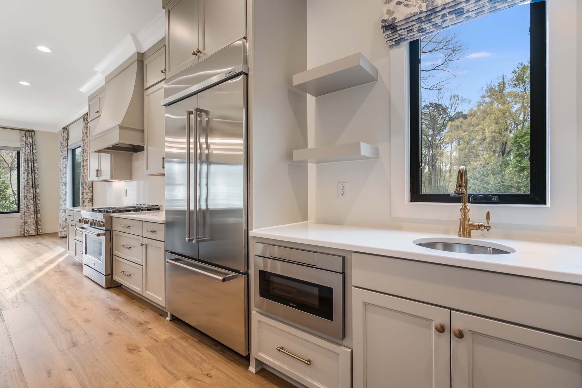 Fog painted cabinetry with pale gray tone