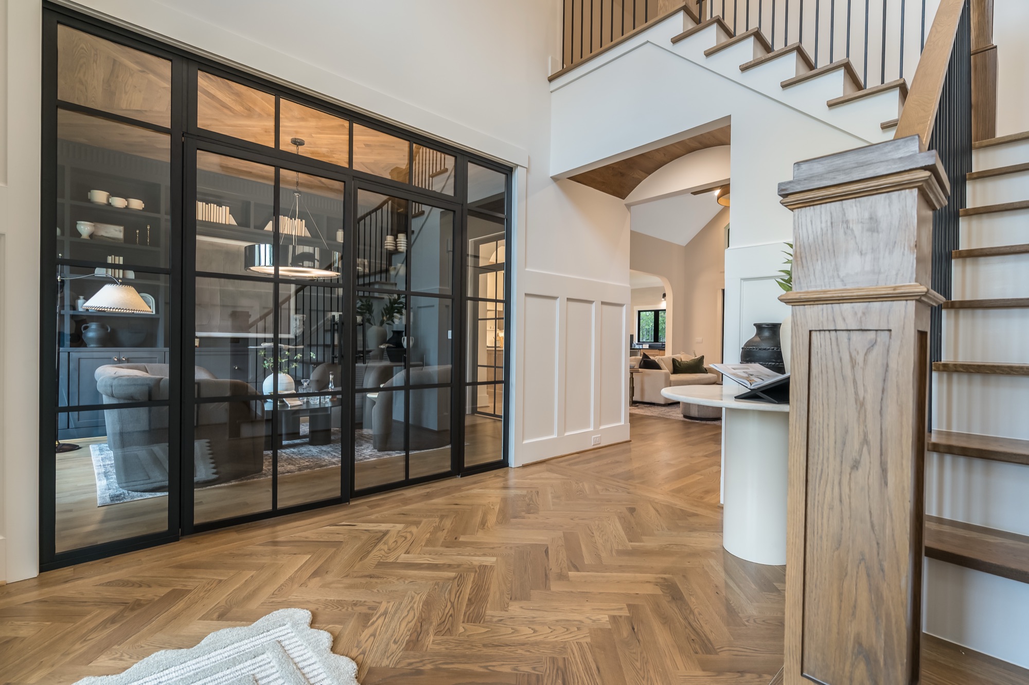 Herringbone parquet hardwood flooring in entry foyer